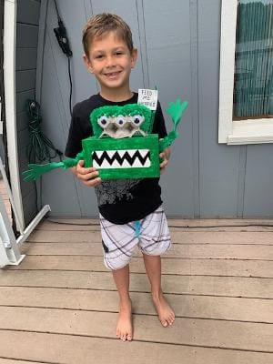 Boy holding worry box
